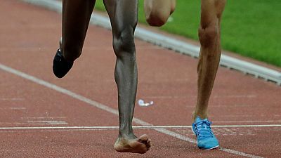 Photos: Shoe off, no problem: Kenyan athlete wins race with one shoe