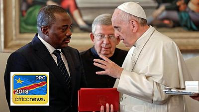 Pope hopes for peace as Congolese await poll results, EU cuts staff