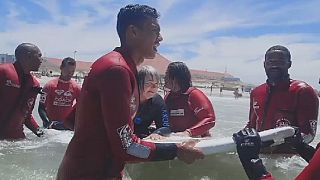 South Africa: physically challenged persons learning to surf