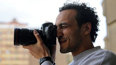 Freed Egypt photojournalist to spend nights at police for next 5 years