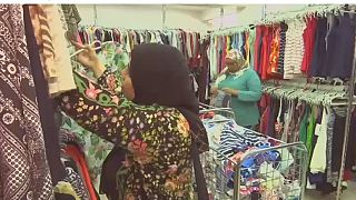 Egyptian store sells clothes by the kilo, easing financial woes