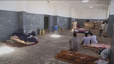 Migrants stranded at a Libyan detention center in hellish conditions