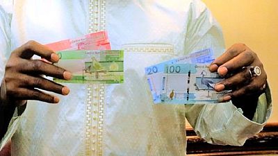 Gambia outdoors new banknotes without Jammeh's portrait