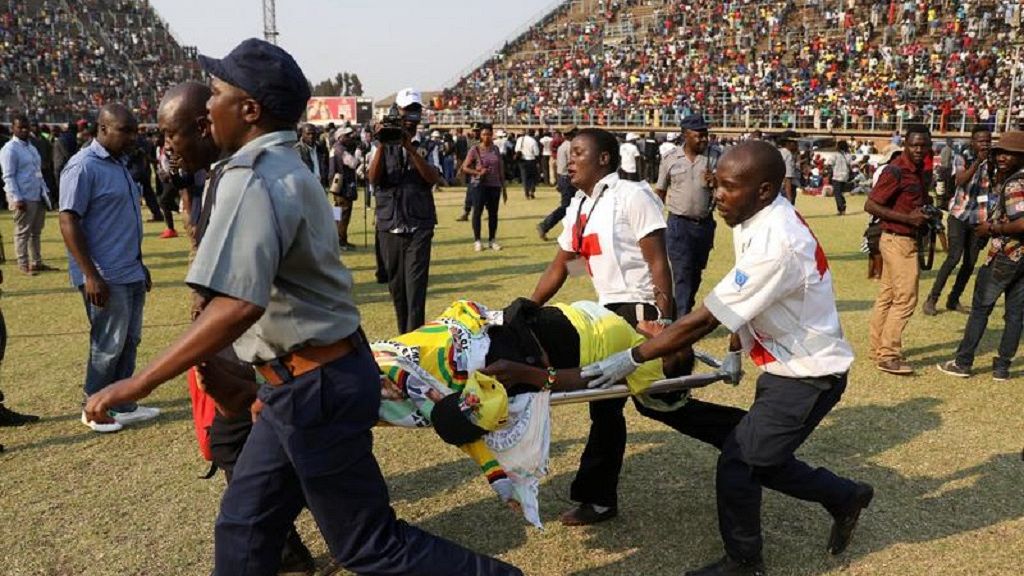 Dozens of mourners injured after stampede at stadium marred first day of Mugabe’s lying in state ceremony