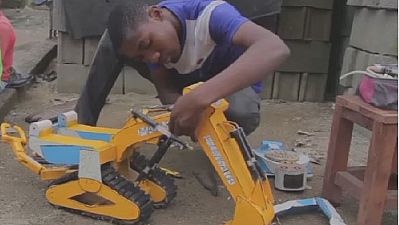 Displaced Cameroonian boy builds remote-controlled toys