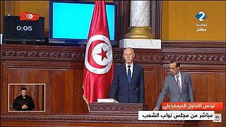 Tunisia's new president takes office, vows to protect women rights