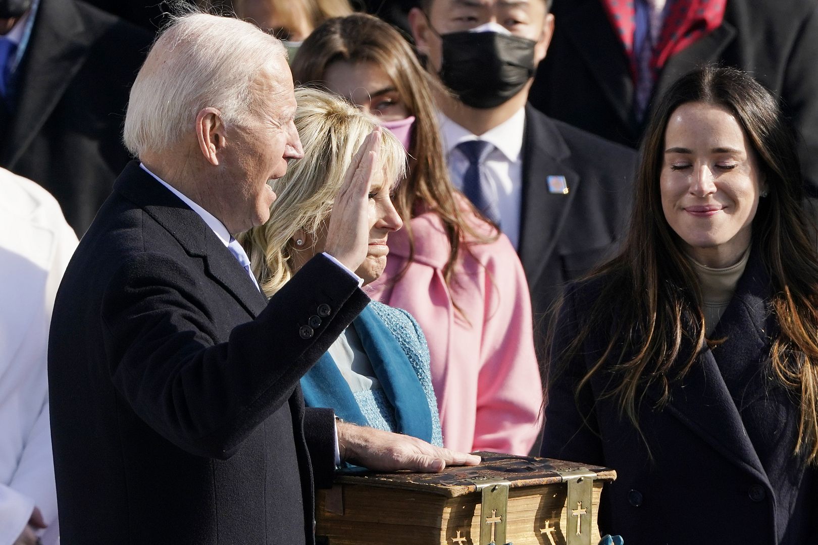 Joe Biden, flanked by incoming US First Lady Jill Biden is sworn in as the 46th US President by Supreme Court Chief Justice John Roberts. January 20, 2021