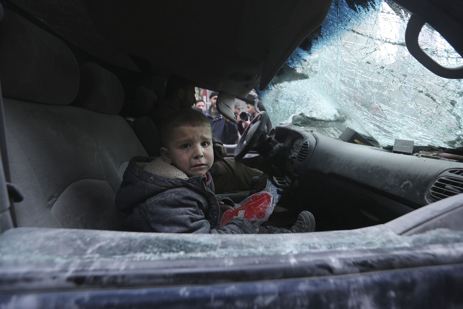 A boy cries after government airstrikes in the town of Ariha, in Idlib province, Syria. 15 January 2020.