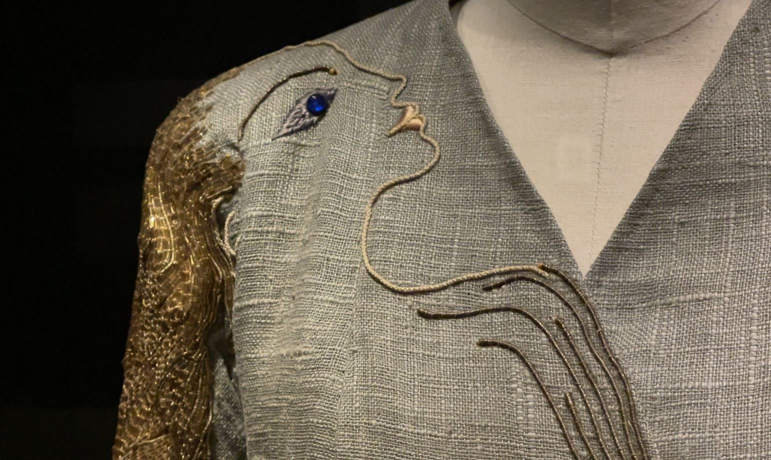 Jean Cocteau is behind the design embroidered on this outfit