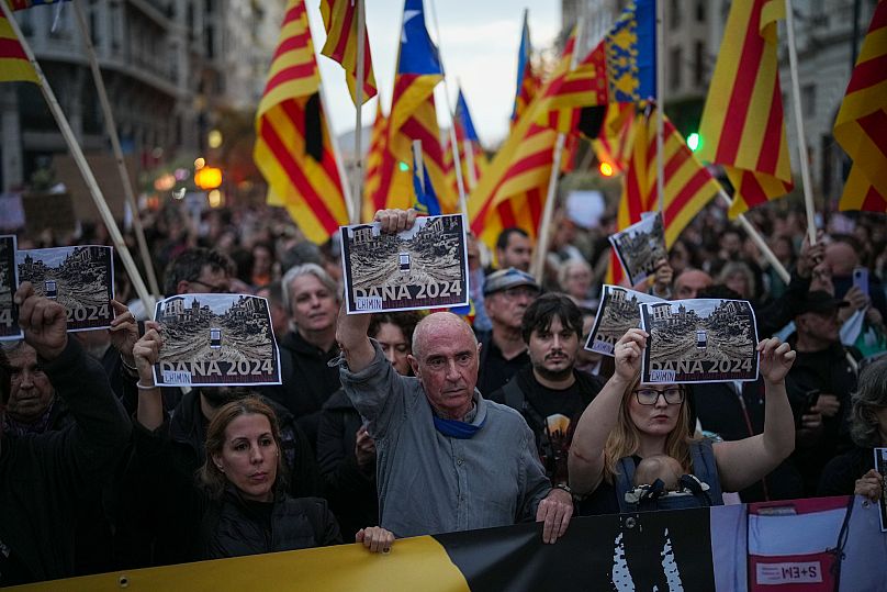 Demonstrators gather for a protest organised by social and civic groups denouncing the handling of the flooding in Valencia, 9 November, 2024