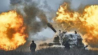 FILE: A self-propelled artillery vehicle fires on the frontline, Donetsk region, Ukraine, Saturday, Feb. 18, 2023. 