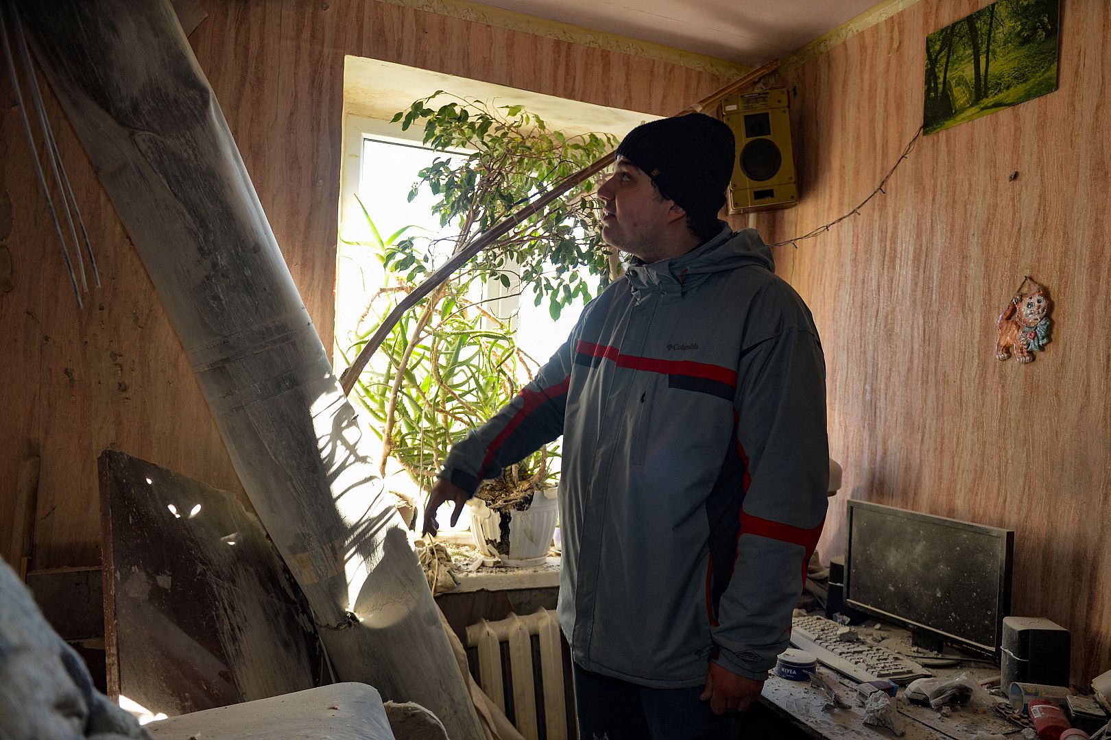 The body of a rocket stuck in a flat after recent shelling on the northern outskirts of Kharkiv on February 24, 2022.