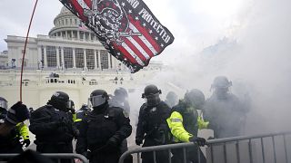 Police hold off Trump supporters who tried to break through a police barrier, Wednesday, Jan. 6, 2021, at the Capitol in Washington.
