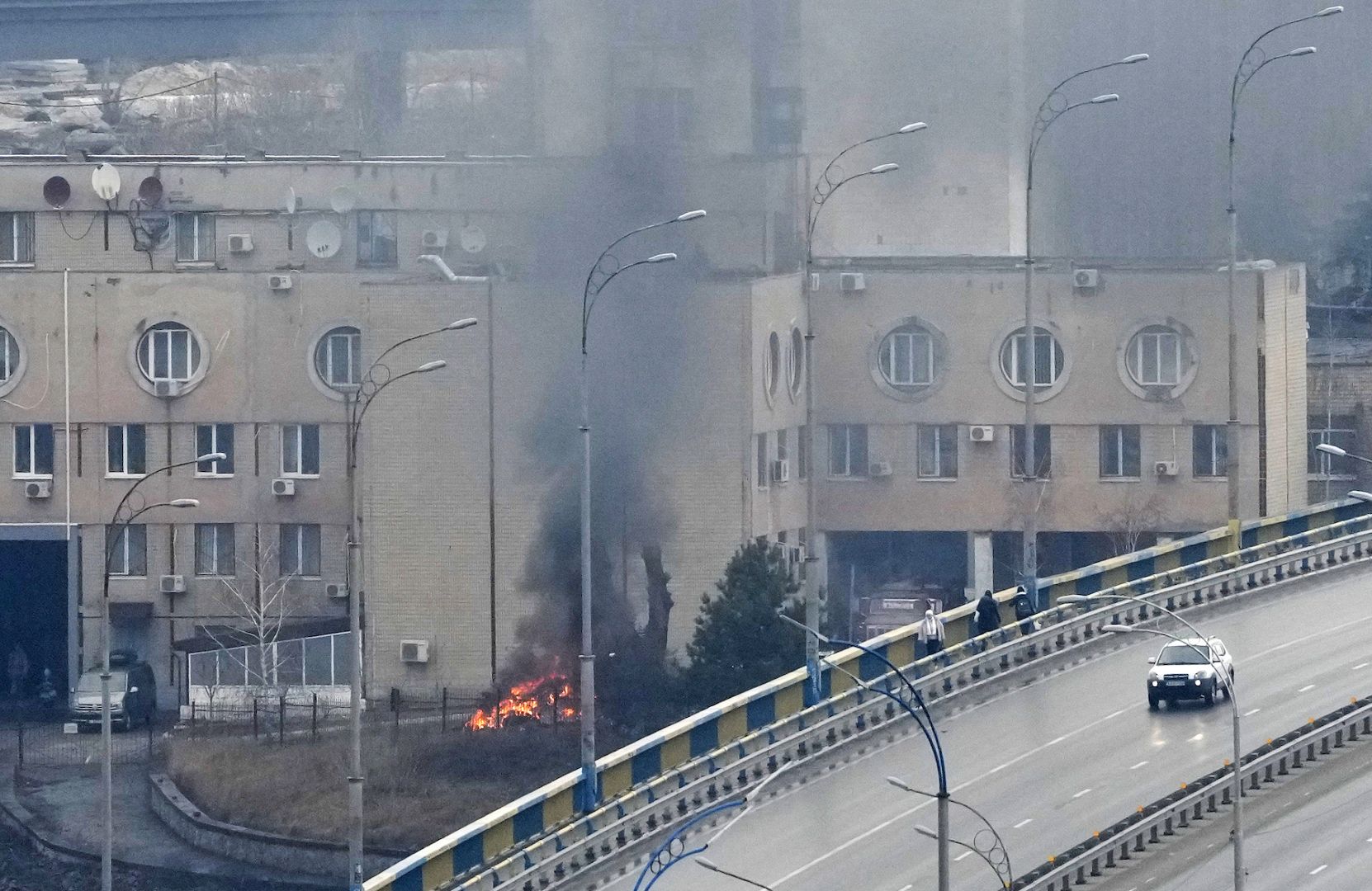 Smoke and flame rise near a military building after a Russian strike in Kyiv, Ukraine. February 24, 2022