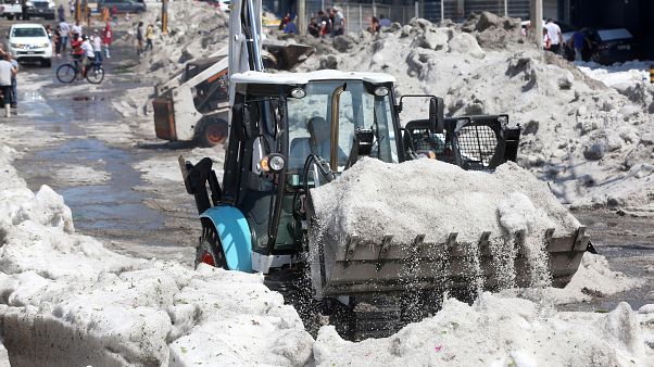 A truck carries ice as it cleans the street after a heavy storm of rain and hail which affected some areas of the city in Guadalajara A truck carries ice as it cleans the street after a heavy storm of rain and hail which affected some areas of the city in Guadalajara