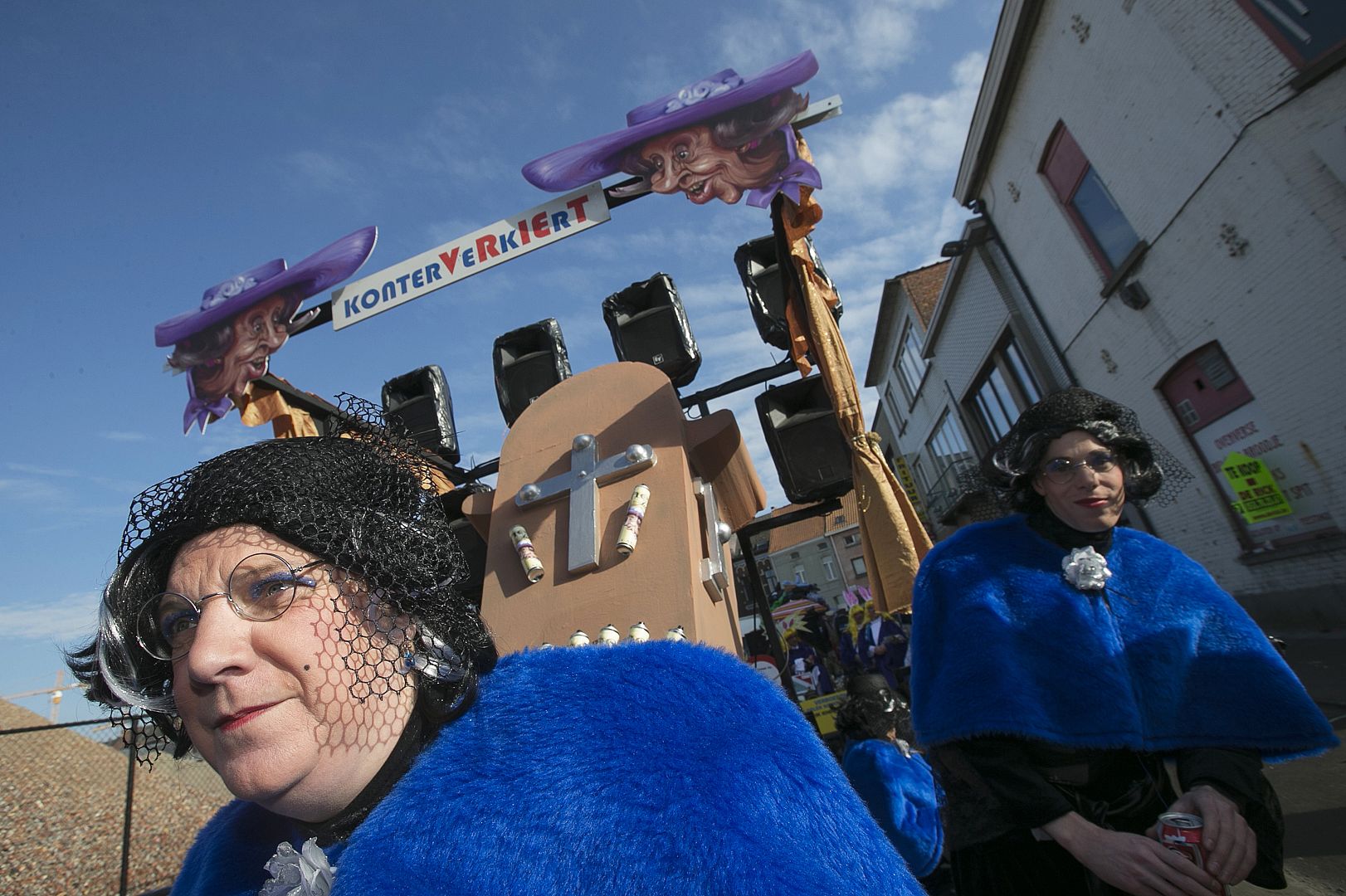 Revellers dressed as late Queen Fabiola take part in the 87th carnival parade of Aalst February 15, 2015.