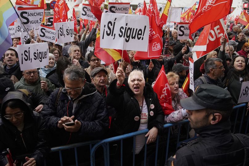 Supporters of Spain's Prime Minister Pedro Sánchez gather at the PSOE party headquarter during a demonstration in Madrid, Spain, Saturday, April 27, 2024