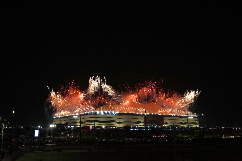 Fireworks explode over the Al Bayt Stadium before the start of the World Cup, group A soccer match between Qatar and Ecuador in Al Khor, Qatar, Sunday, Nov. 20, 2022.