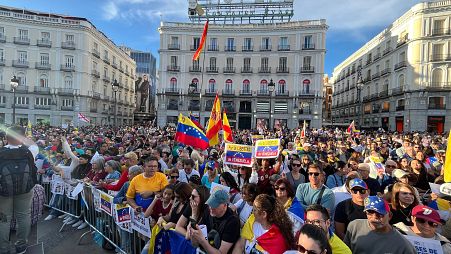Venezuelans protest for democracy in their country in Madrid's Puerta del Sol.