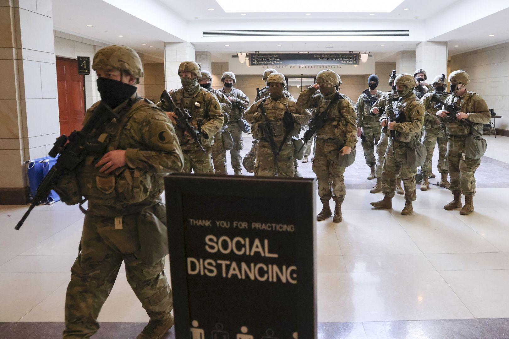 National Guard troops leave the U.S. Capitol Visitor Center after rehearsals for President-elect Joe Biden's inauguration, in Washington. January 18, 2021