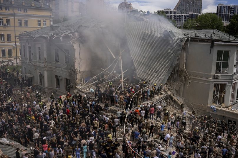 Emergency workers respond at the Okhmatdyt children's hospital hit by Russian missiles, in Kyiv, Ukraine, Monday, July 8, 2024.