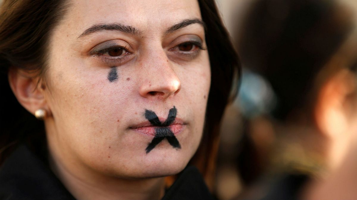 A woman demonstrates against sexual violence in Marseille, France