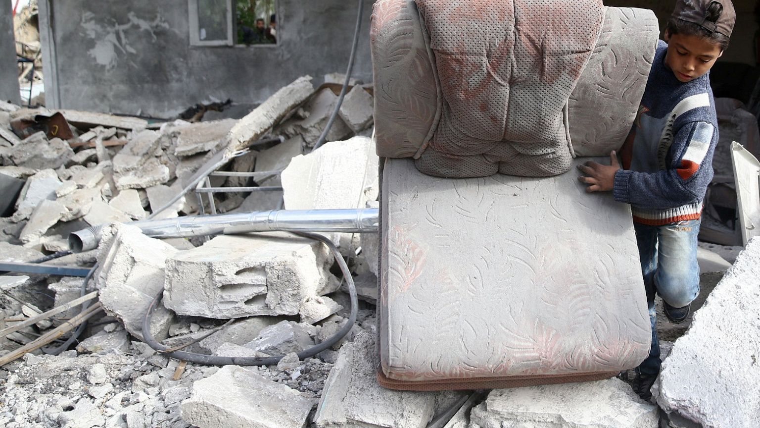 Dozens killed as Syrian increases siege on last rebel-held stronghold 