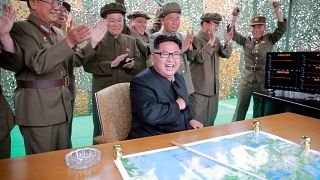 North korea leader celebrating firing new missile 