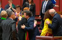 Australian Senators celebrate the approval of same-sex marriage legislation