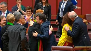 Australian Senators celebrate the approval of same-sex marriage legislation