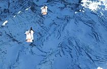 The daring stunt took place in the Swiss Alps