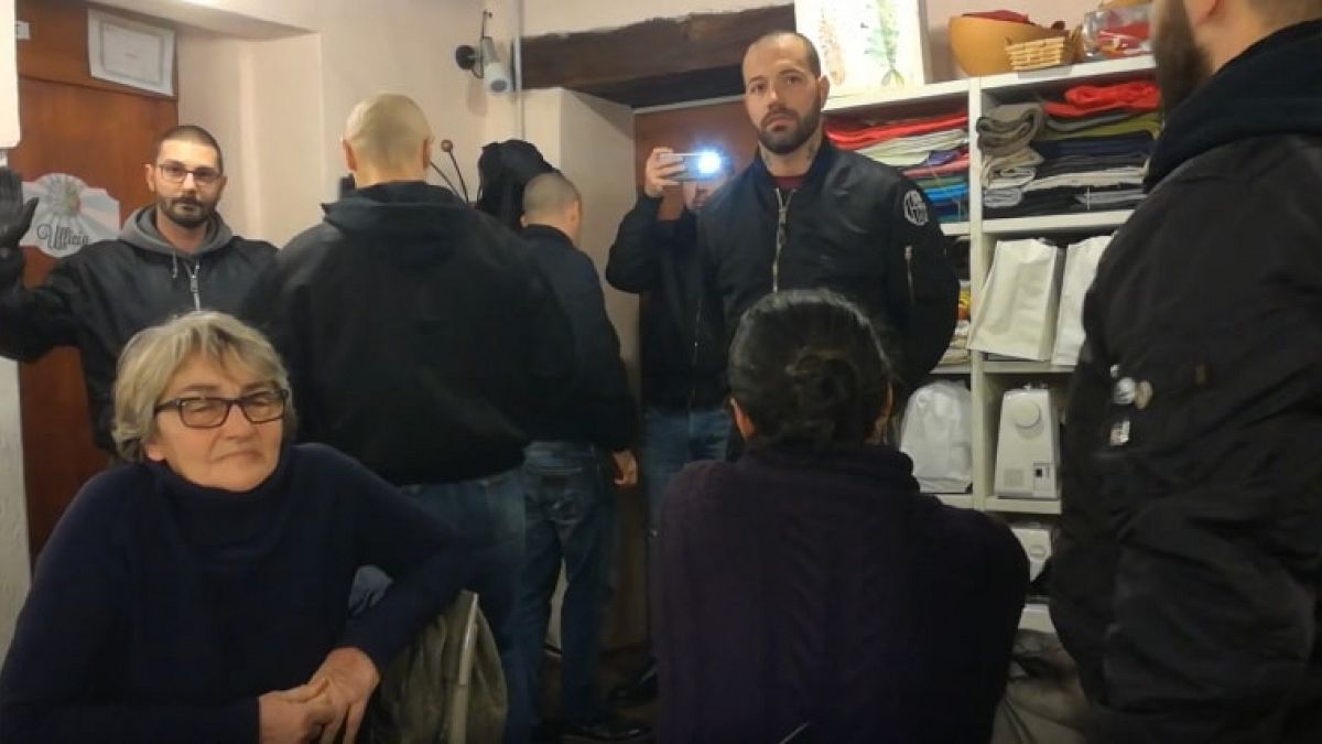 Neo-Nazi gang crash pro-migrant meeting in Italy