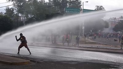 Wasserwerfer, Tränengas, Schlagstöcke in Tegucigalpa