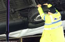 UK police officer stops van falling off bridge 
