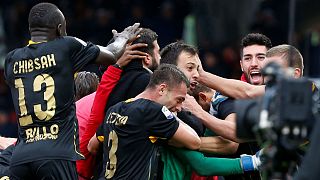 Alberto Brignoli celebrates with teammates after scoring goal