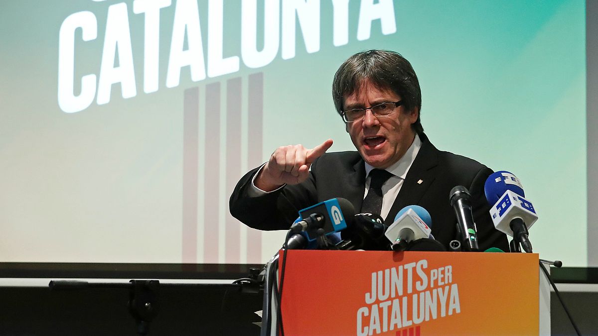 Ousted Catalan leader Carles Puigdemont gives a speech at the launch