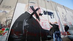 Mural depicting US President Trump in the West Bank city of Bethlehem