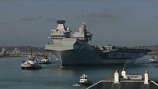HMS Queen Elizabeth: Britain's biggest aircraft carrier commissioned into service