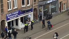 Palesztin zászlót lengető férfi törte be egy kóser étterem ablakait Hollandiában