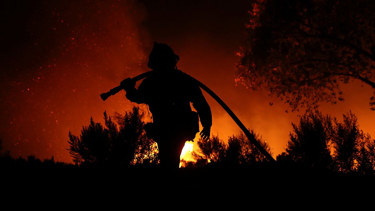 Californian firefighters battle inferno - and fatigue