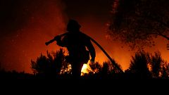 Californian firefighters battle inferno - and fatigue