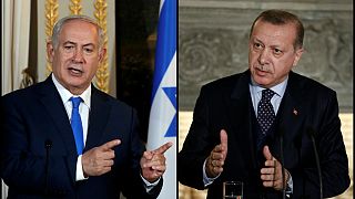 الرئيس التركي رجب طيب إردوغان (يمين) ورئيس الوزراء الإسرائيلي نتنياهو