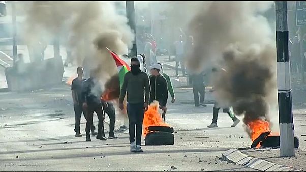 Stone throwing is met with tear gas in Gaza clashes Stone throwing is met with tear gas in Gaza clashes