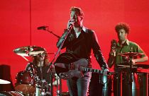 Homme in una performance ai Grammy Awards nel 2014