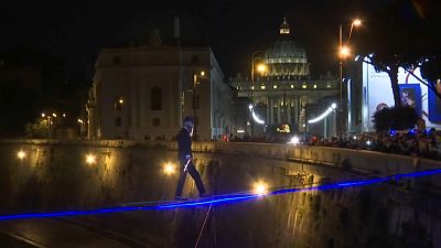 Watch: tightrope walker crosses Rome's Tiber River