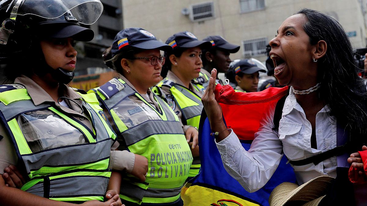 Una delle foto più significative delle proteste in Venezuela