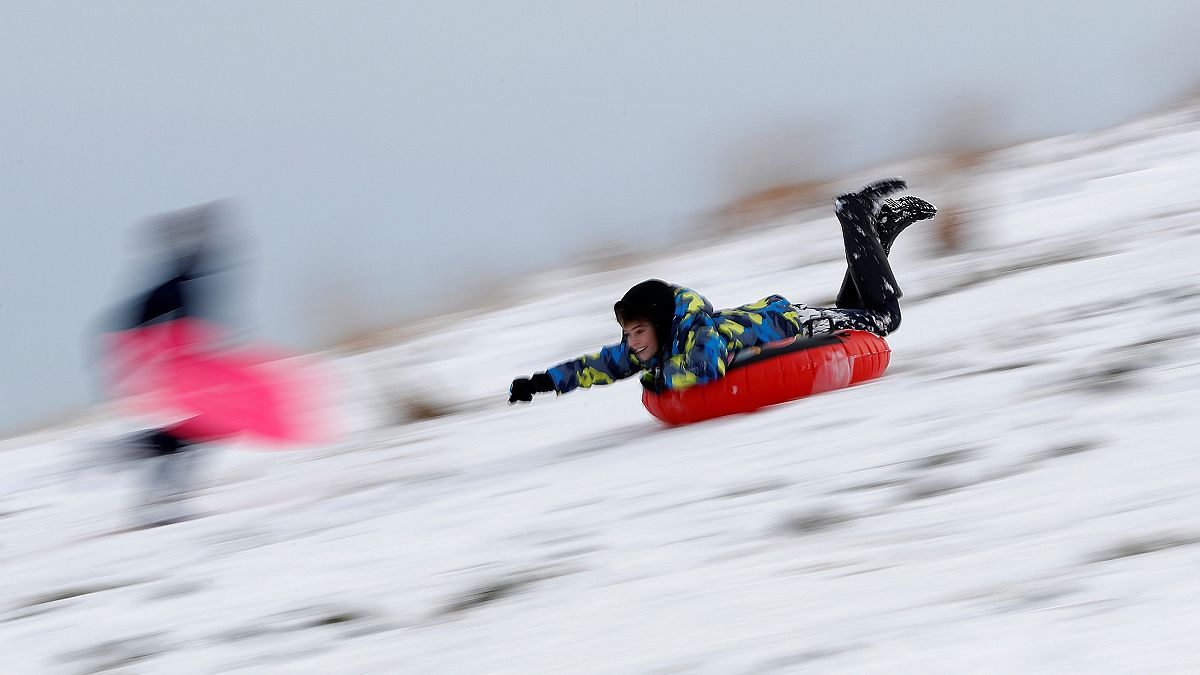 Chaos—and some fun—as snow hits parts of western Europe