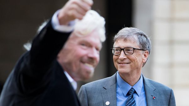 Richard Branson (au premier plan) et Bill Gates à l'Elysée Richard Branson (au premier plan) et Bill Gates à l'Elysée
