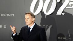 Actor Daniel Craig poses for photographers on the red carpet at the German 