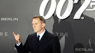 Actor Daniel Craig poses for photographers on the red carpet at the German 